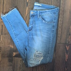 Distressed Blue Jeans